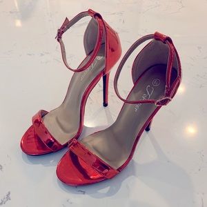 Red metallic heels